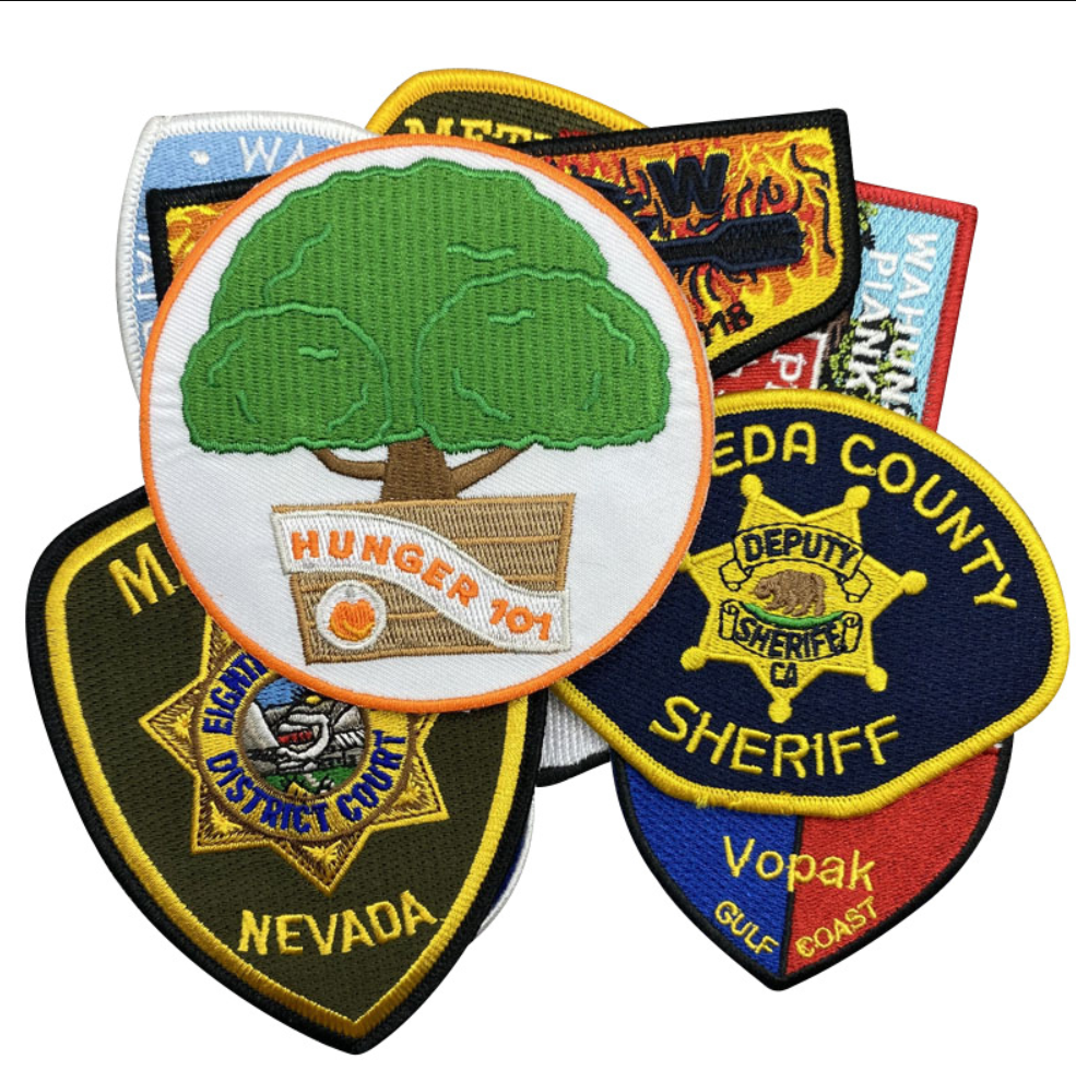 Side-by-side comparison of an embroidered patch and a woven patch with the same logo